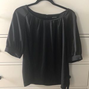 Black blouse with cute finishing touches